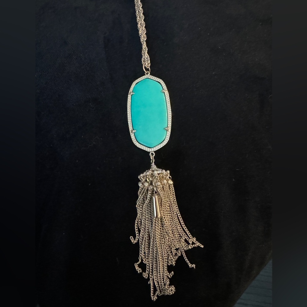 Turquoise/Green center stone in gold hardware
